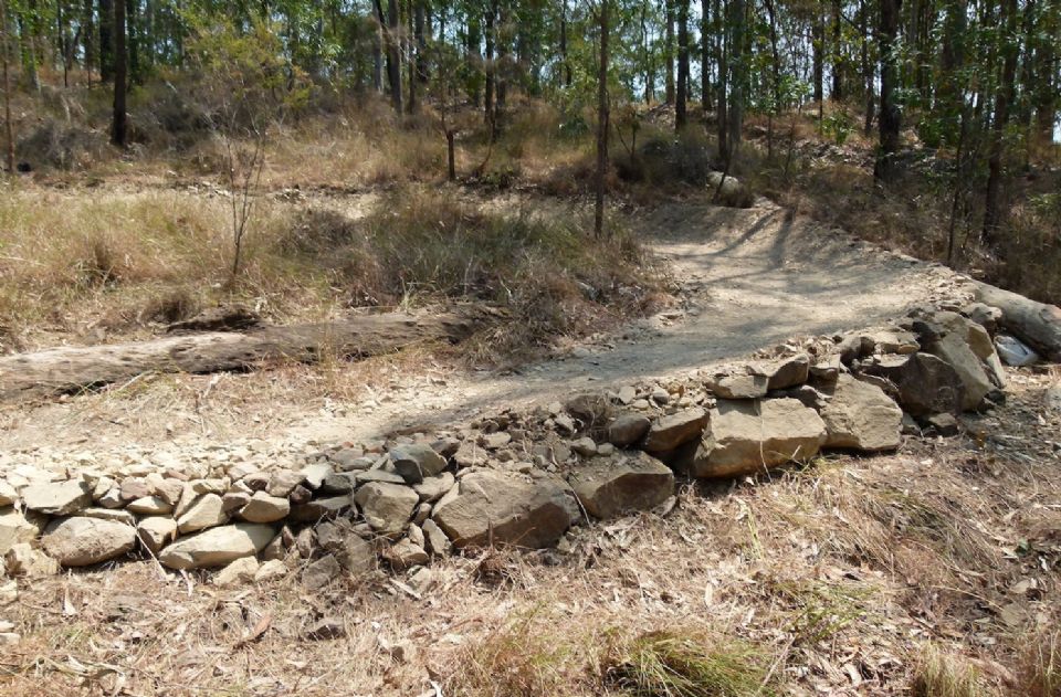 No longer a steeply angled berm.  Now a raised tread climbing turn